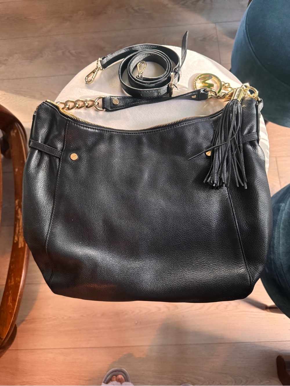 Michael Kors Black Leather Hobo Bag with Gold Hardware and Tassel